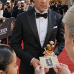 The Movie Star Stopped the Entire Red Carpet After Seeing an Old Ticket… The Secret Behind It Left Everyone Speechless (Part 2)